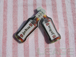 Compressed advertising towel (beer bottle shape)