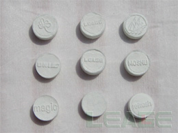 Compressed coin tissue