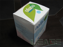 Compressed coin tissue packaging